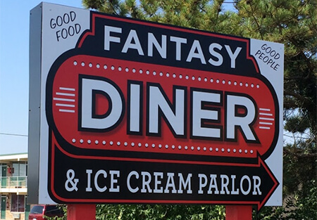 Restaurant Road Sign